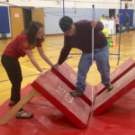 Joey bounces over quadangle steps on NSCD's obstacle course