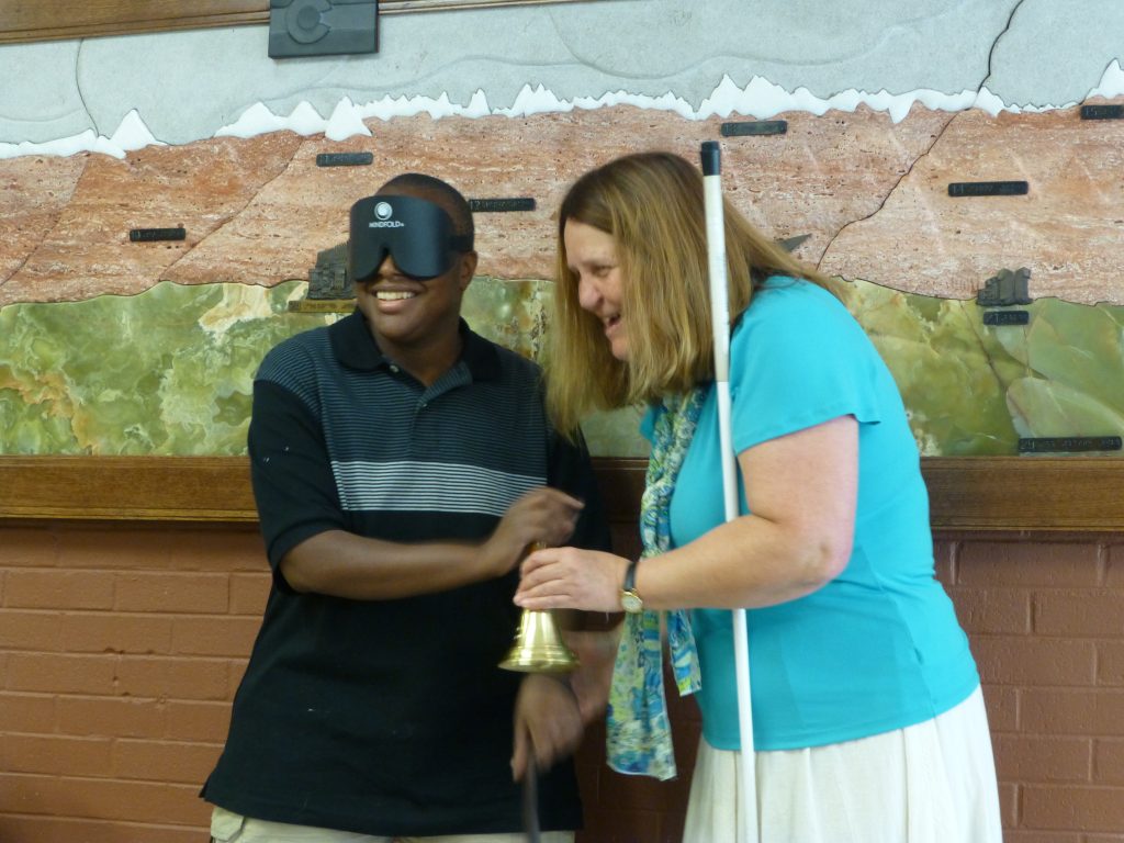 Christopher receiving the bell