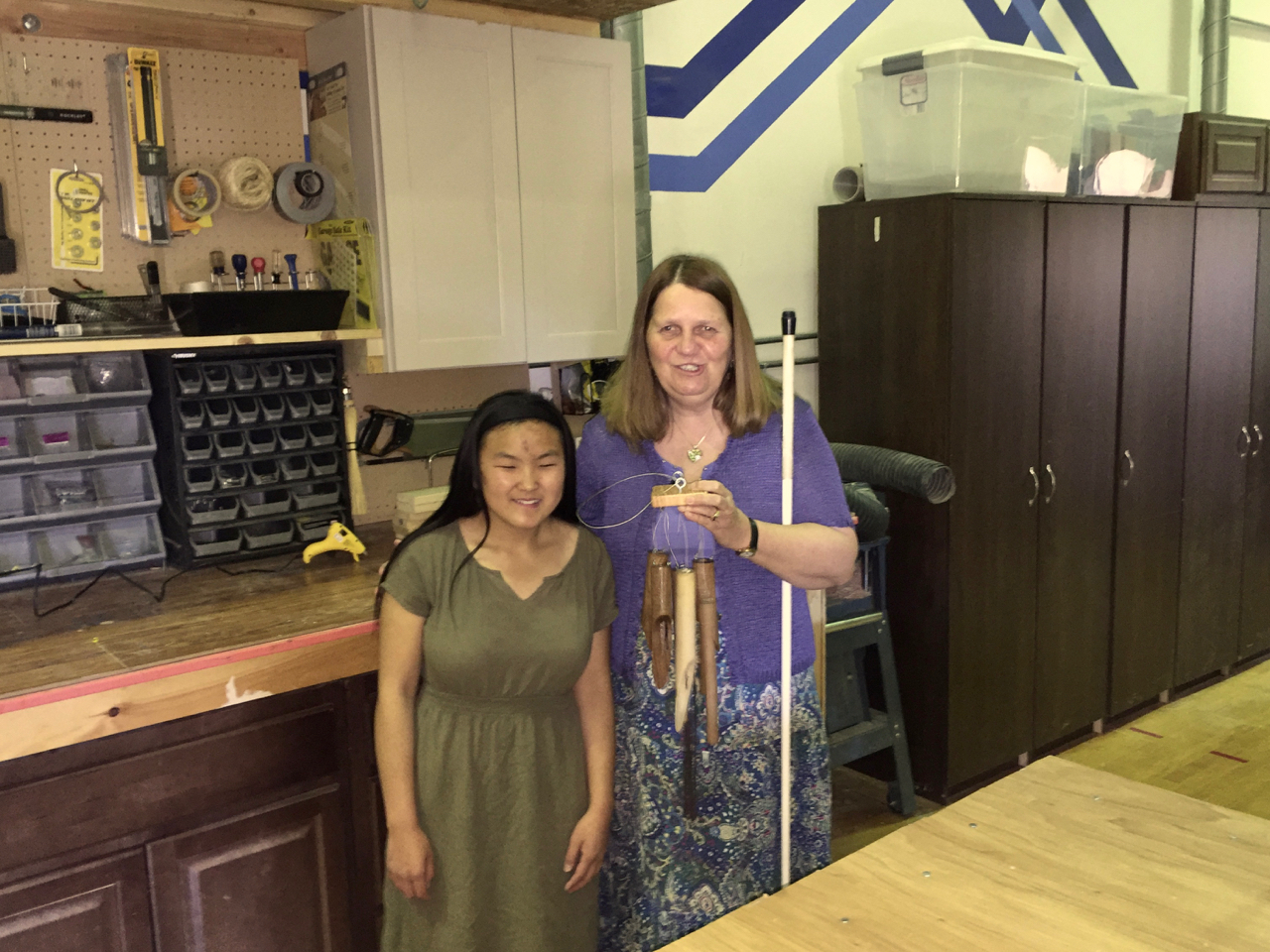 In the Shop Suzi shows Julie her Wind Chimes