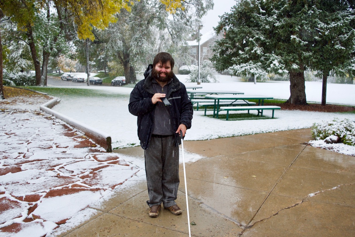 David K. walks through the snow on a winter morning