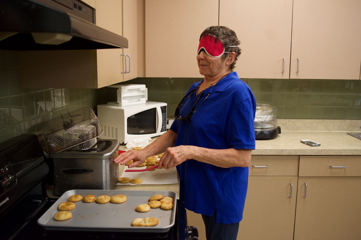 Dee works with trays of home made cookies hot out of the oven