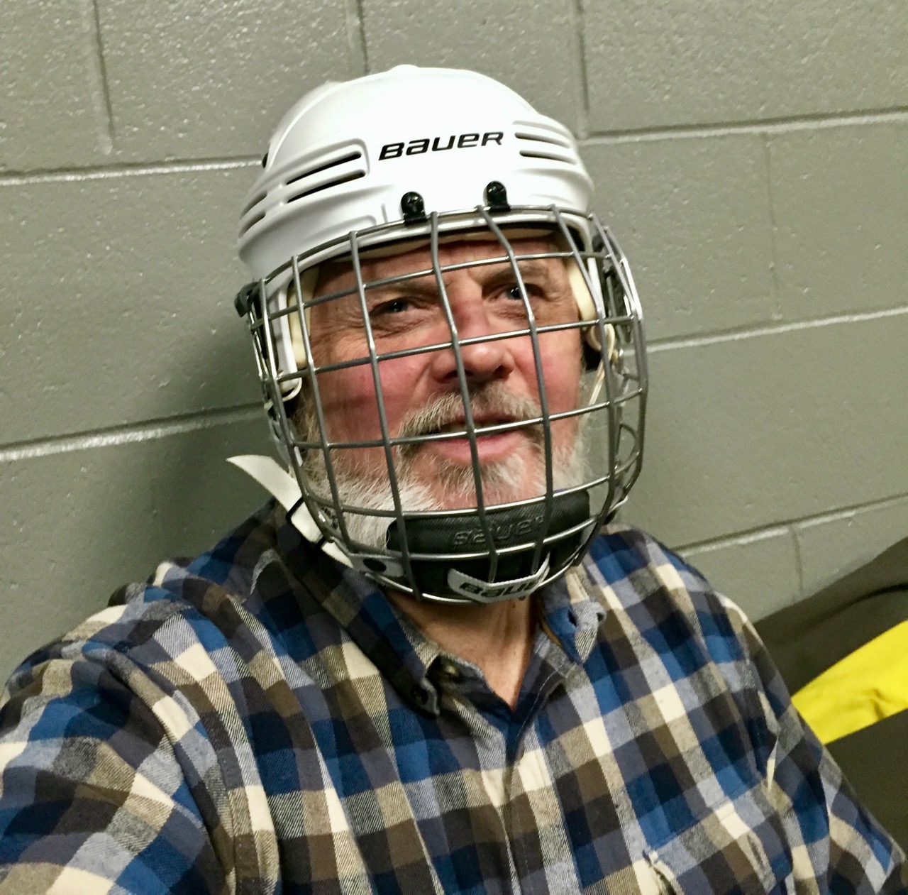 Dan in his hockey helmet and mask