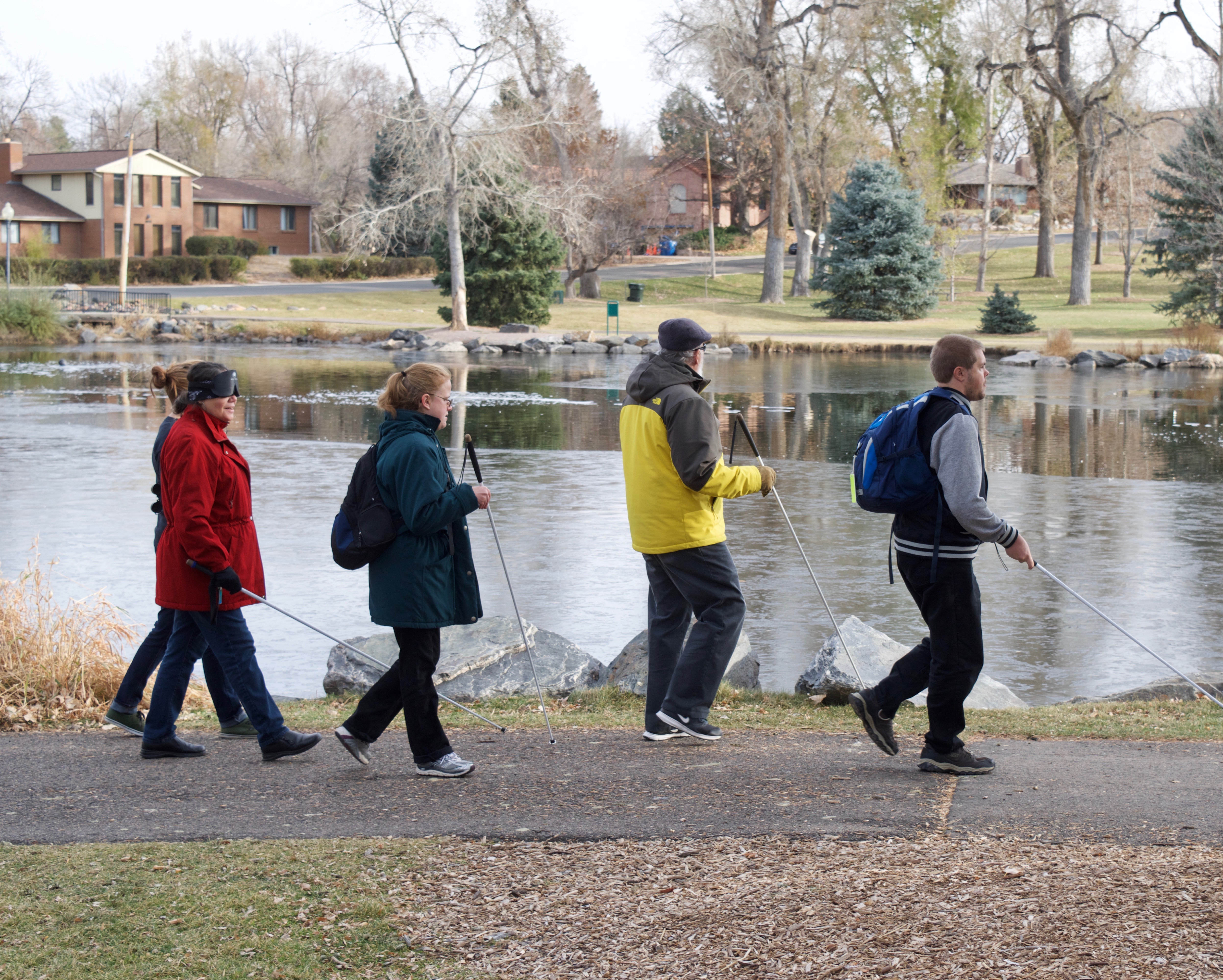 Allie, Blanca, C.G., Dan, and Mike walking around the pond at Sterne Park during Birding by Ear