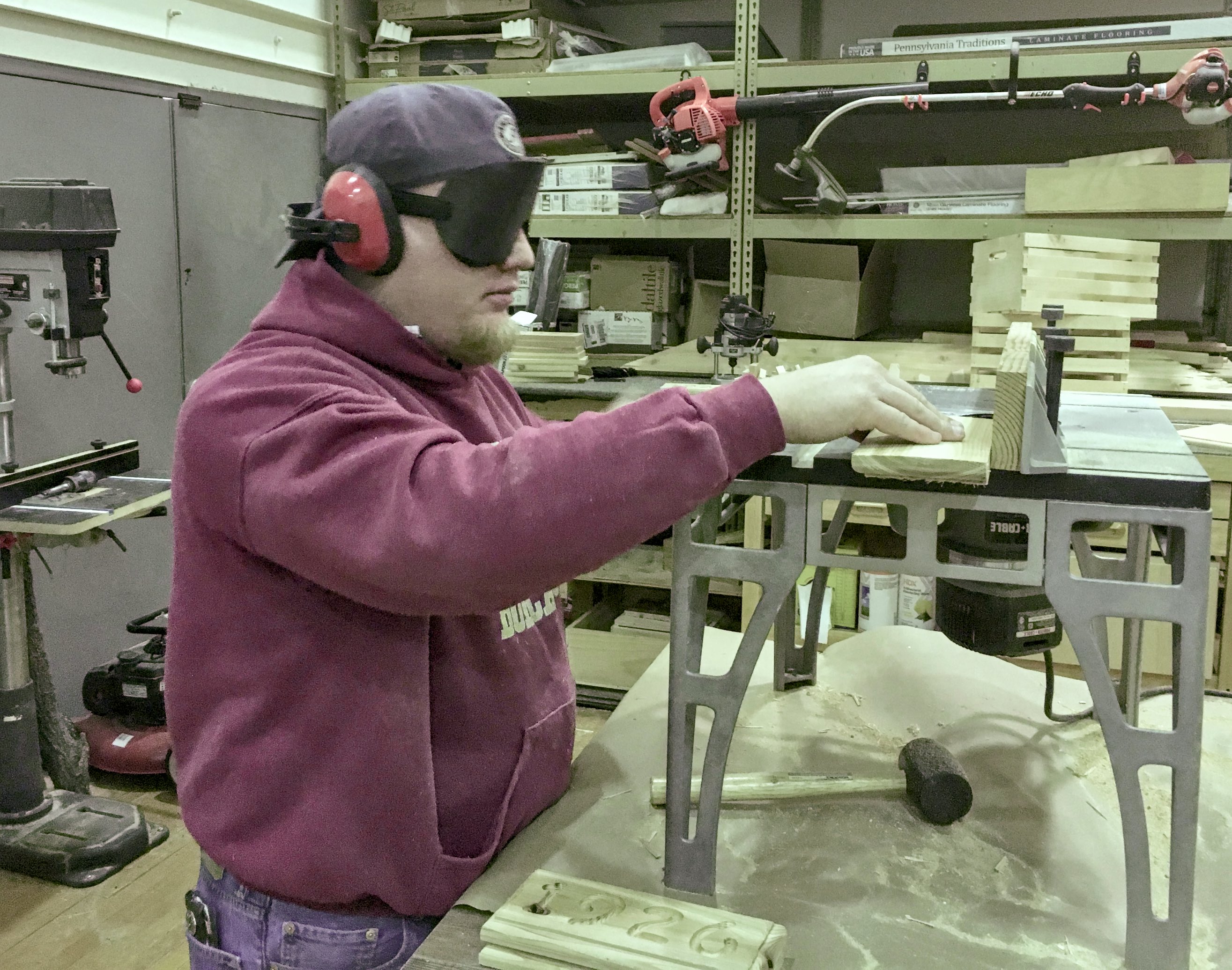 Daniel uses the router table