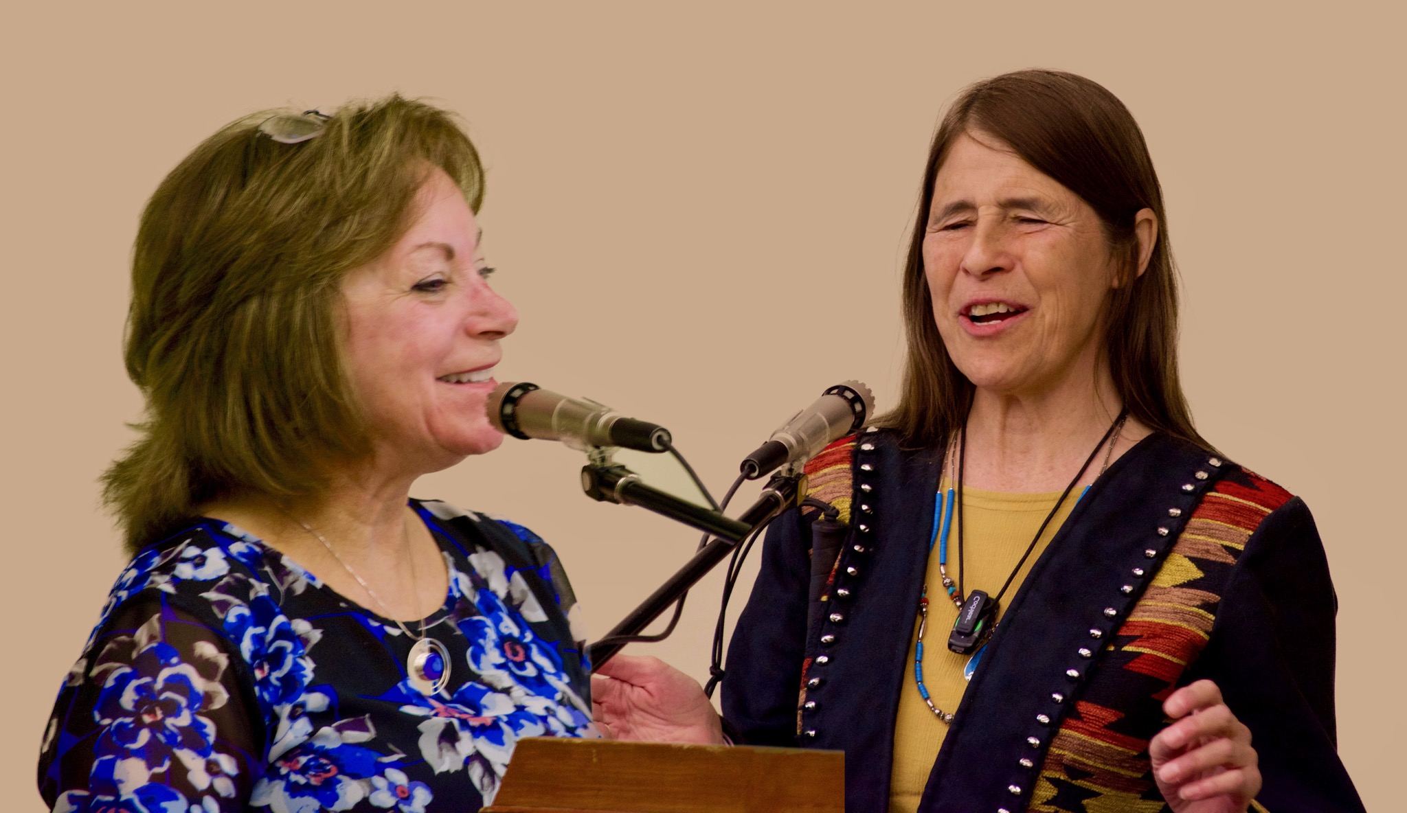 Dianne Primavera and Judy Mares-Dixon at the podium