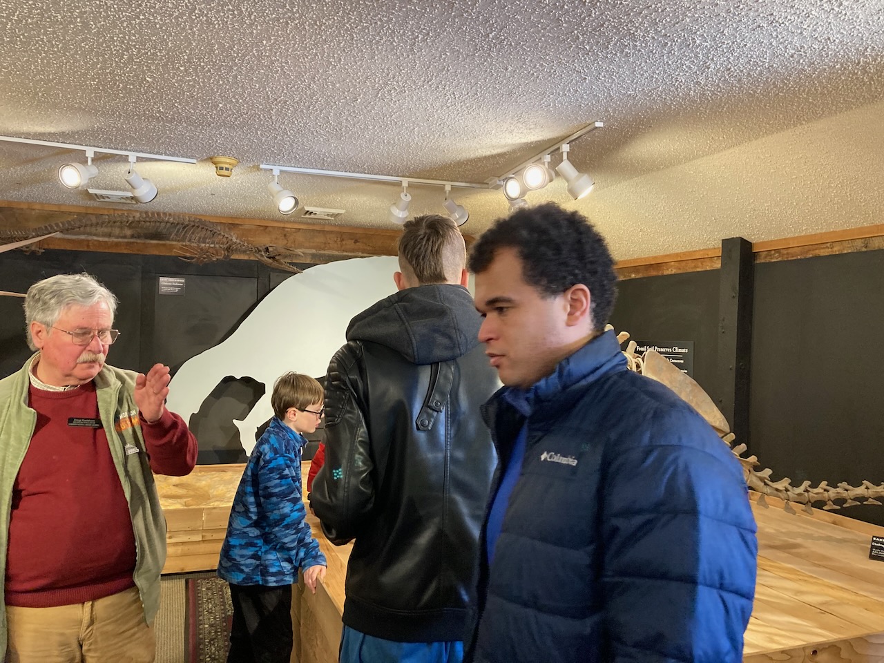 Doug, our Museum tour guide talks to the visitors in the Cretaceous room