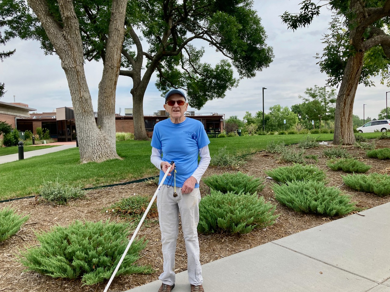 Driver Phil with white cane