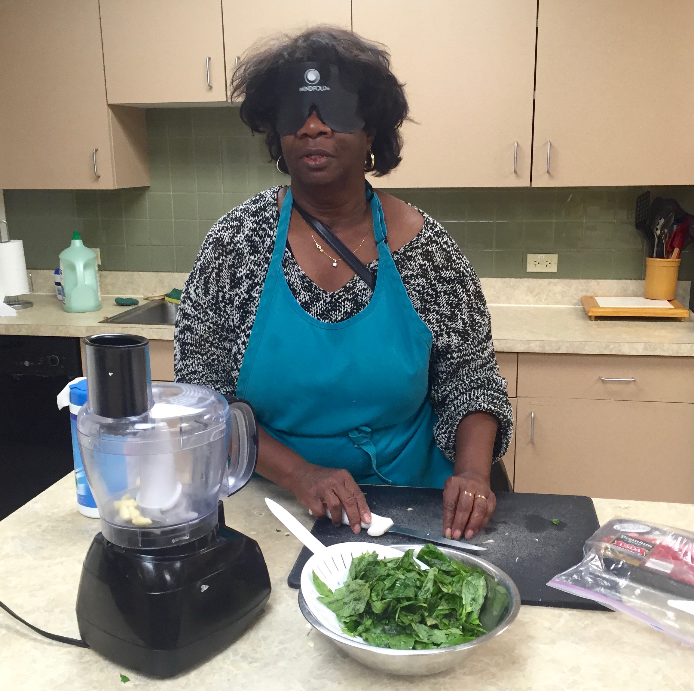 a woman prepares a salad
