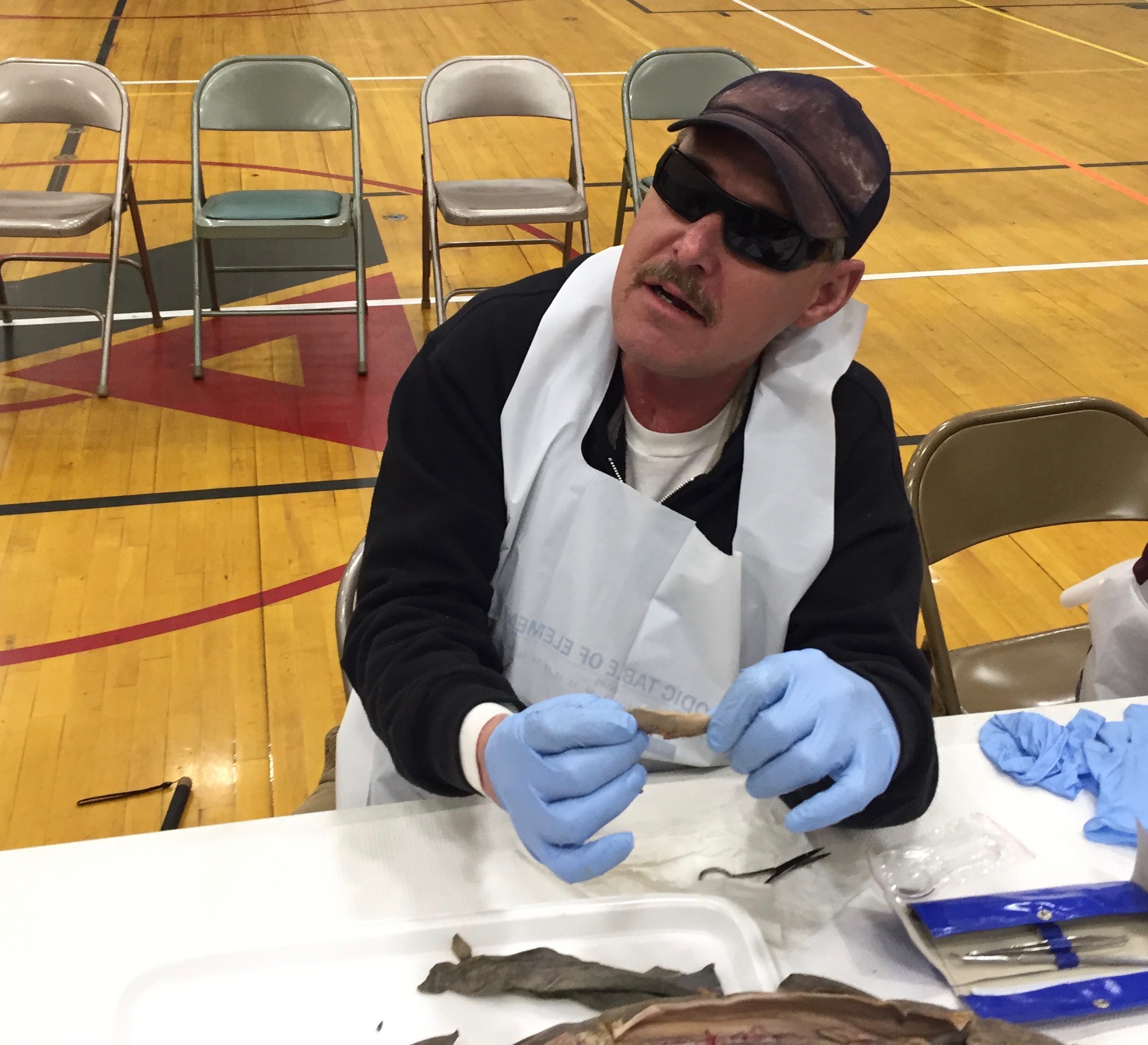 CCB student John did dissections before losing his sight. Here he shows the shark's lung
