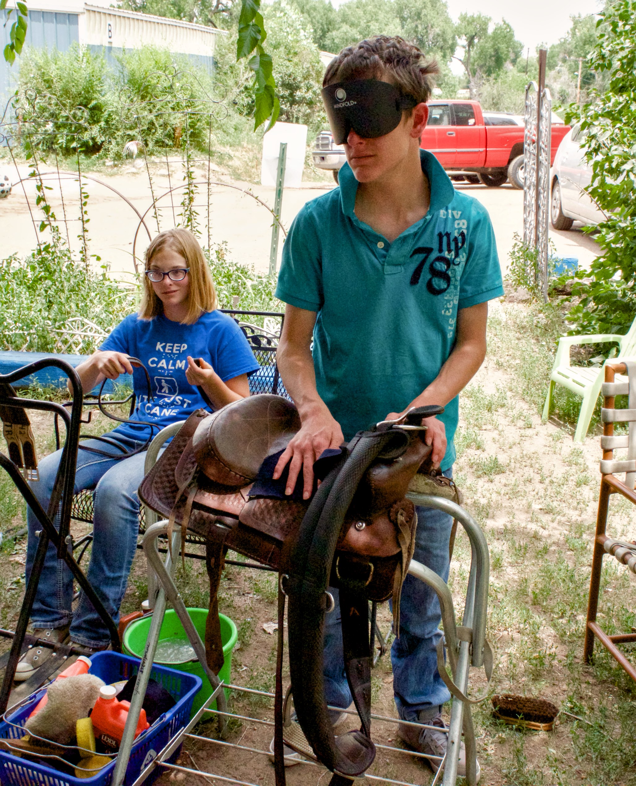 Keaton works on cleaning and polishing a large cinch