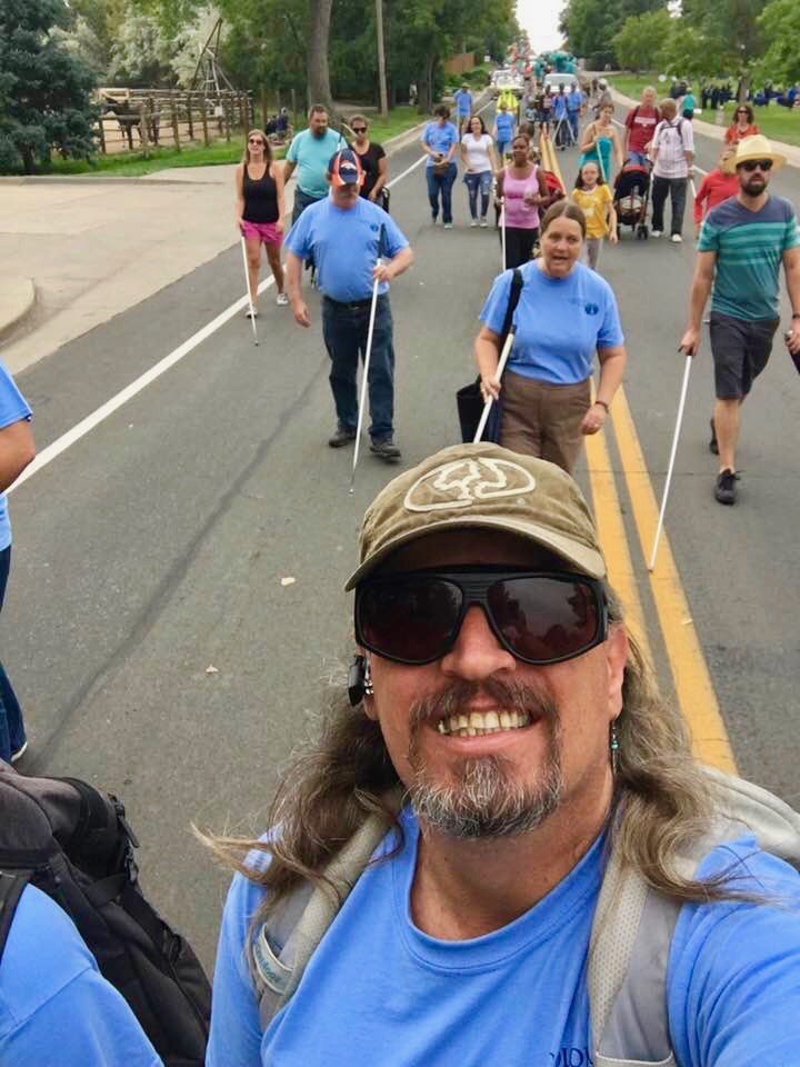 Kirk marching with CCB in the Western Welcome Week Parade