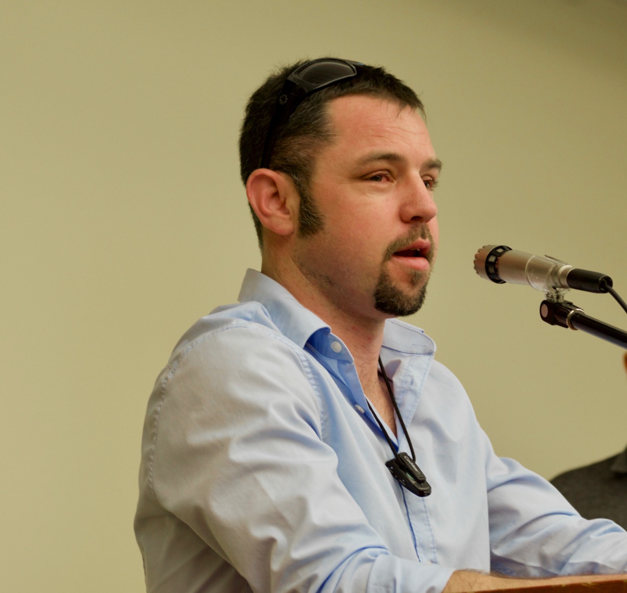 Marcus Sands at the podium