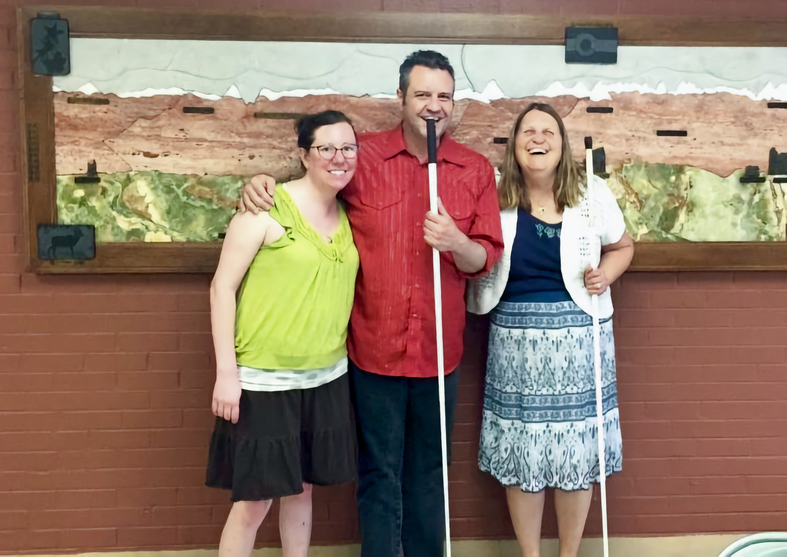 NFB of Kansas President Tom Page and Nicole with Julie Deden on their 1st Visit to the Center