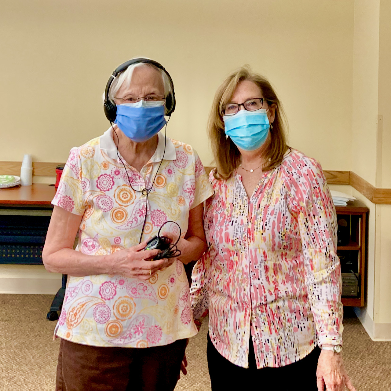 Two women in face masks
