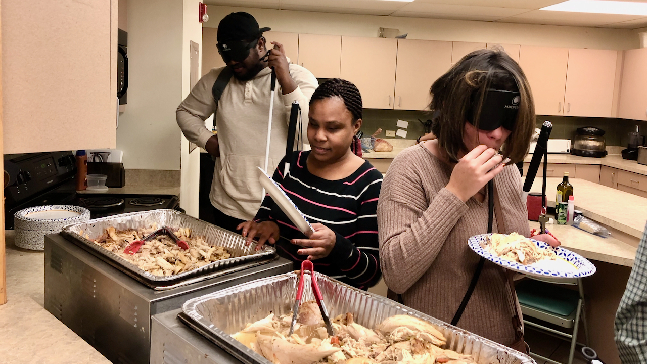 People filling Thanksgiving plates