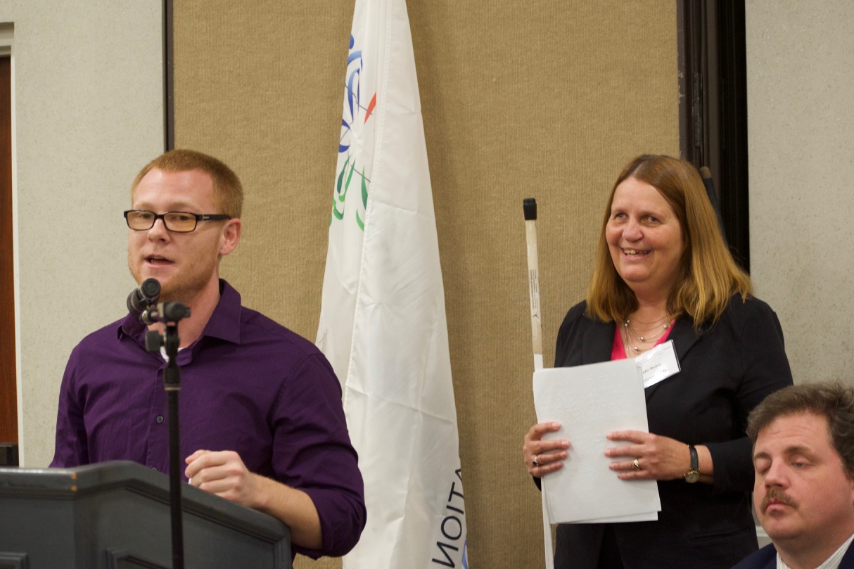 Ryan at the podium with Julie and Scott to the right at NFBCO17