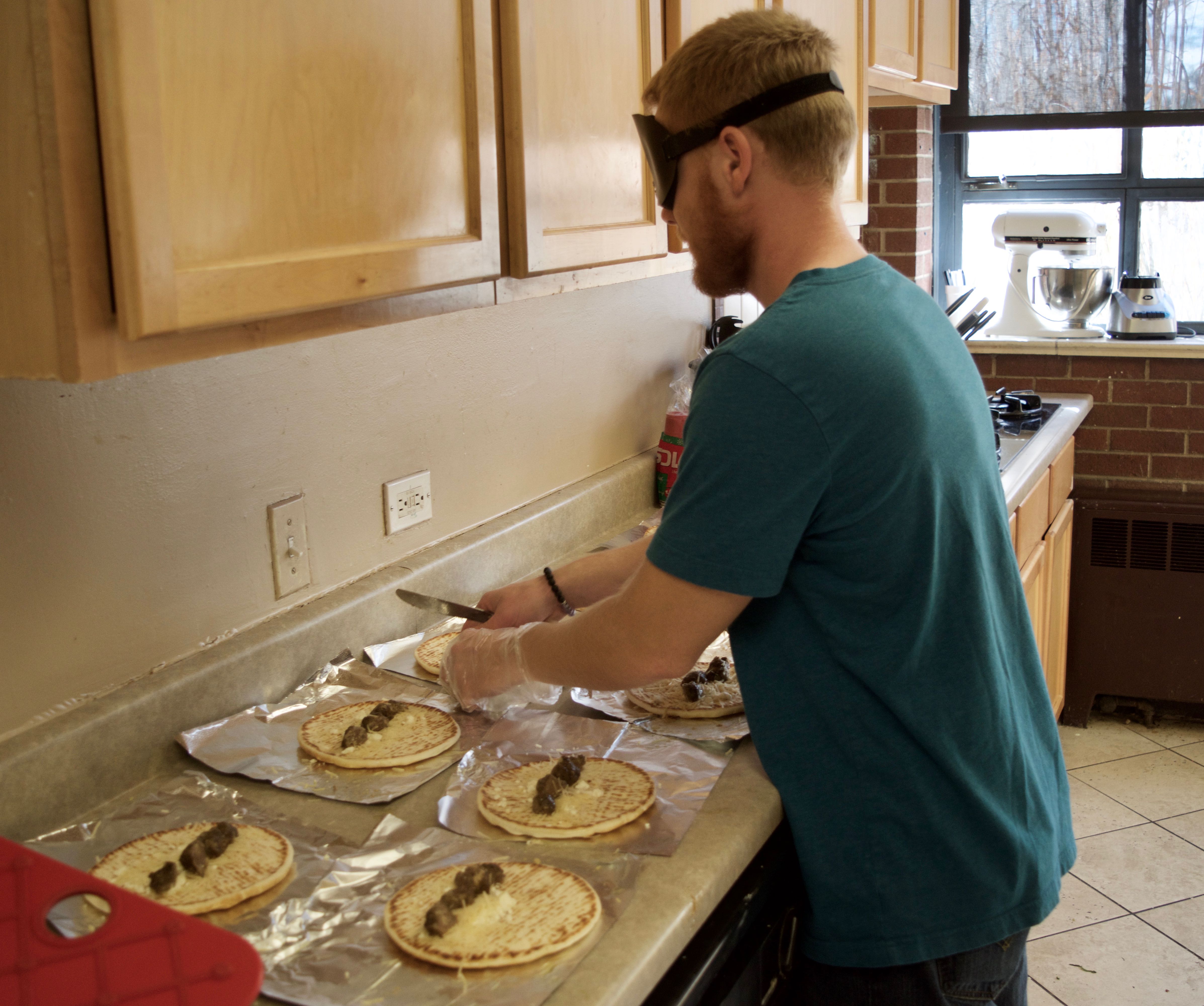 Ryan making Giro wraps for his mini meal