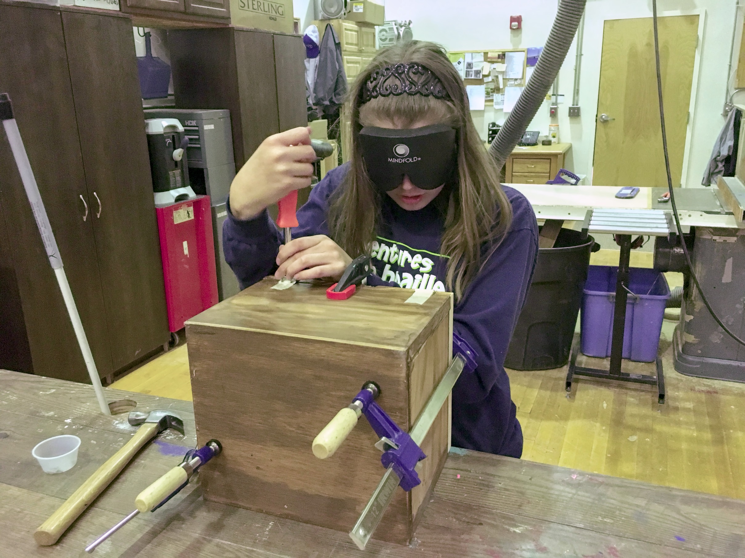 Shelby puts hinges on her wooden box