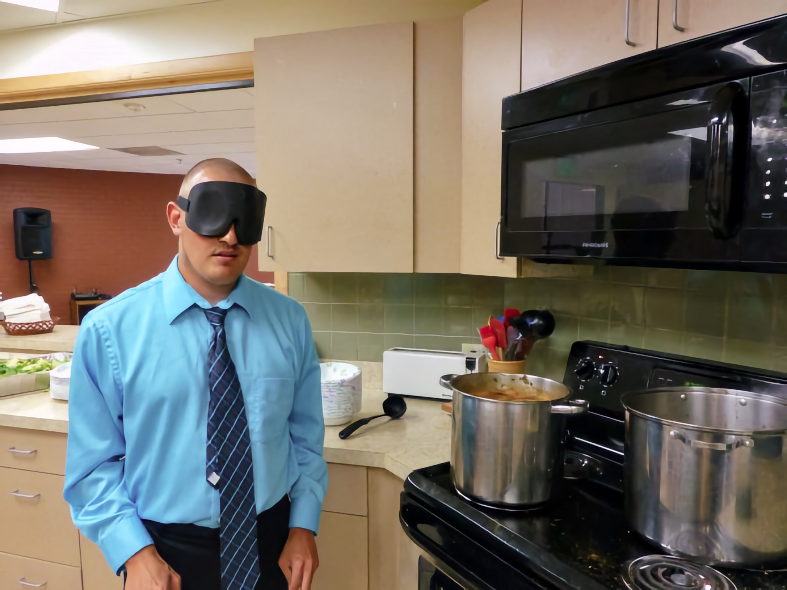 Andy readying his soup to be served
