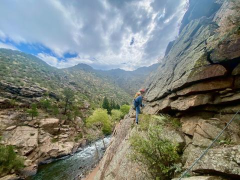 Gene seen from above as he nears the top. Clear Creek visible far below.