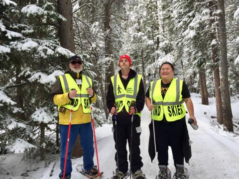 Dan, Anthony and Showe with two guides on the snowshoe trail at Lake Eldora