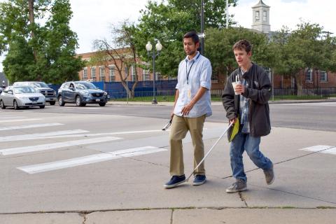 Will Reynolds works with summer student Keaton.