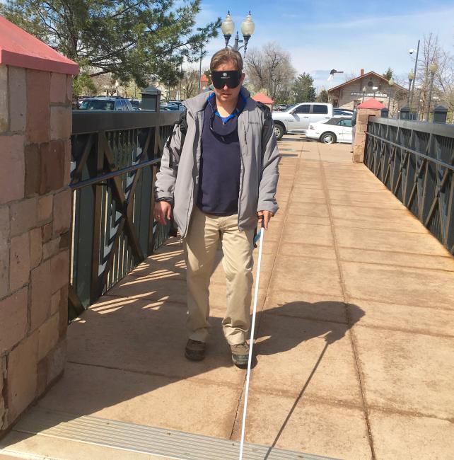 Curt crossing the bridge at Littleton Downtown Station