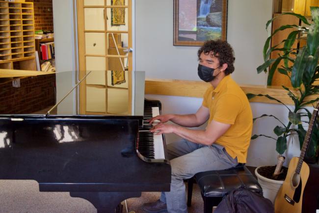 Ernesto playing the Piano