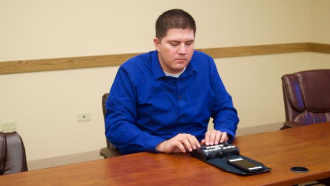 Martin makes use of a Braille  Display