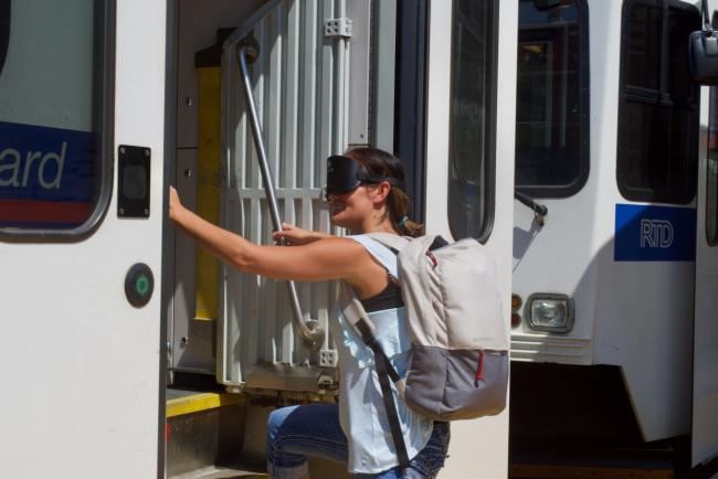 Amanda getting on the train