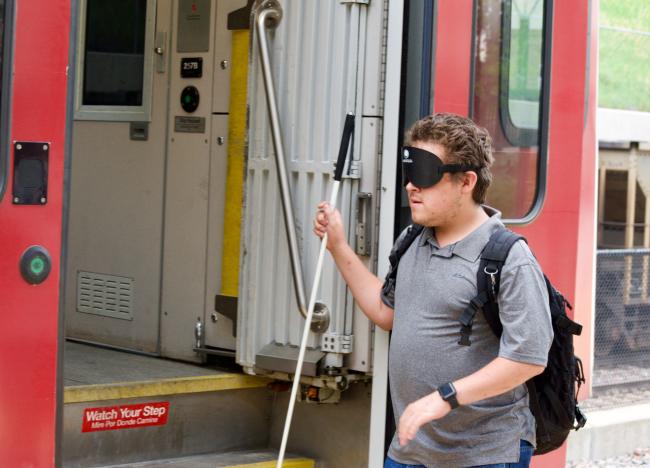 Andres about to board the light rail