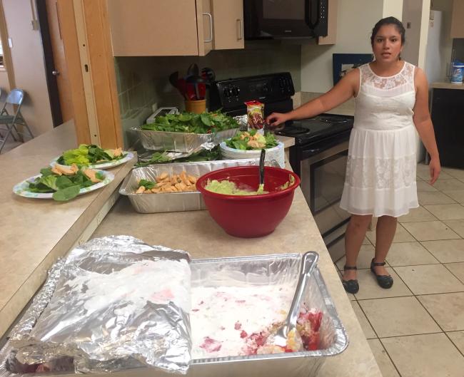 Cindy with her Grad meal ready to serve