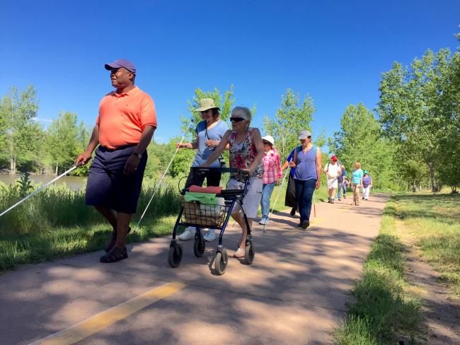 Group of Seniors Hiking along the High Line Trail to the Platt River