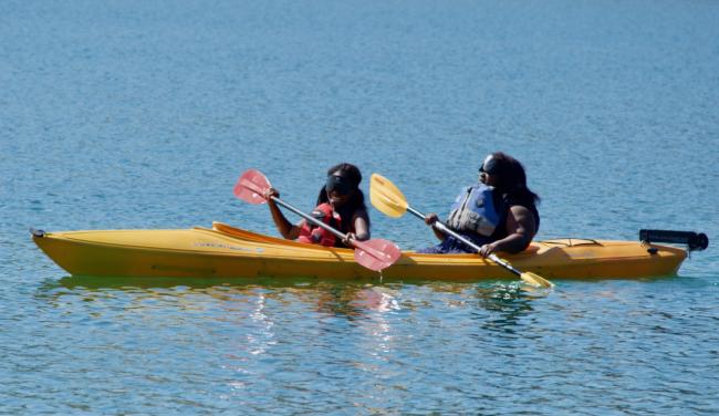 Lexy and Kosy in a double kayak