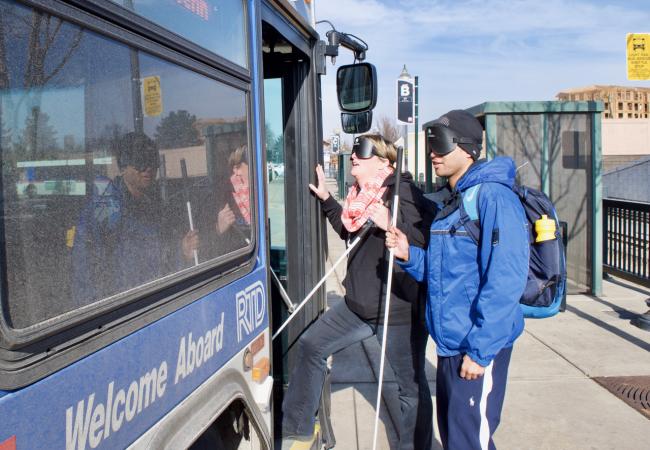Libby and Chaz about to get on an RTD Bus