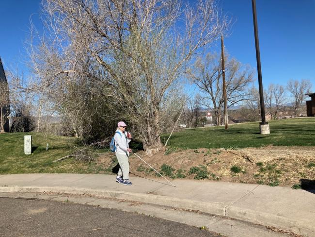 One of the In Charge students approaches the Center Sidewalk