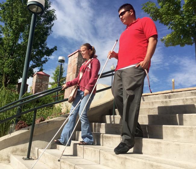 Vika and MArtin going down the steps at Littleton Downtown Station
