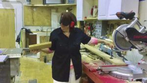 Marlene at the chop saw after her 1st cut