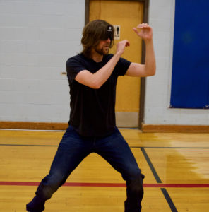 Graham in a fighting stance in Martial Arts Class
