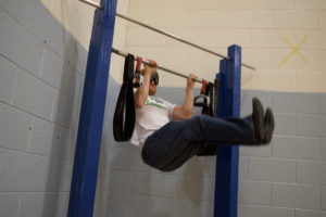 Ryan at the Pull Up Station doing leg lift pull ups