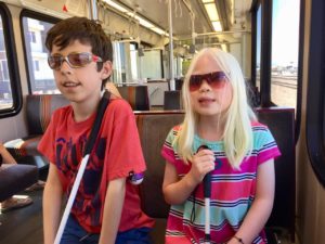 Ty and Chloe ride the Light Rail