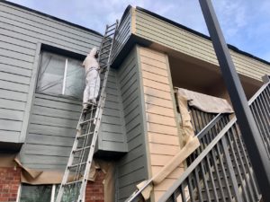 Repainting the trim at McGeorge Mountain Terrace