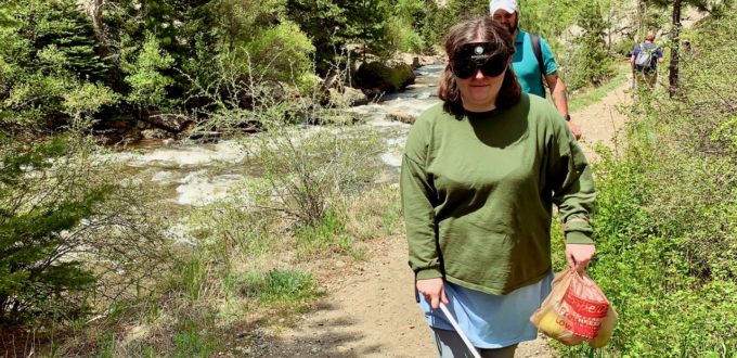 Holly Scott-Gardner Hiking along Clear Creek on her first day at CCB