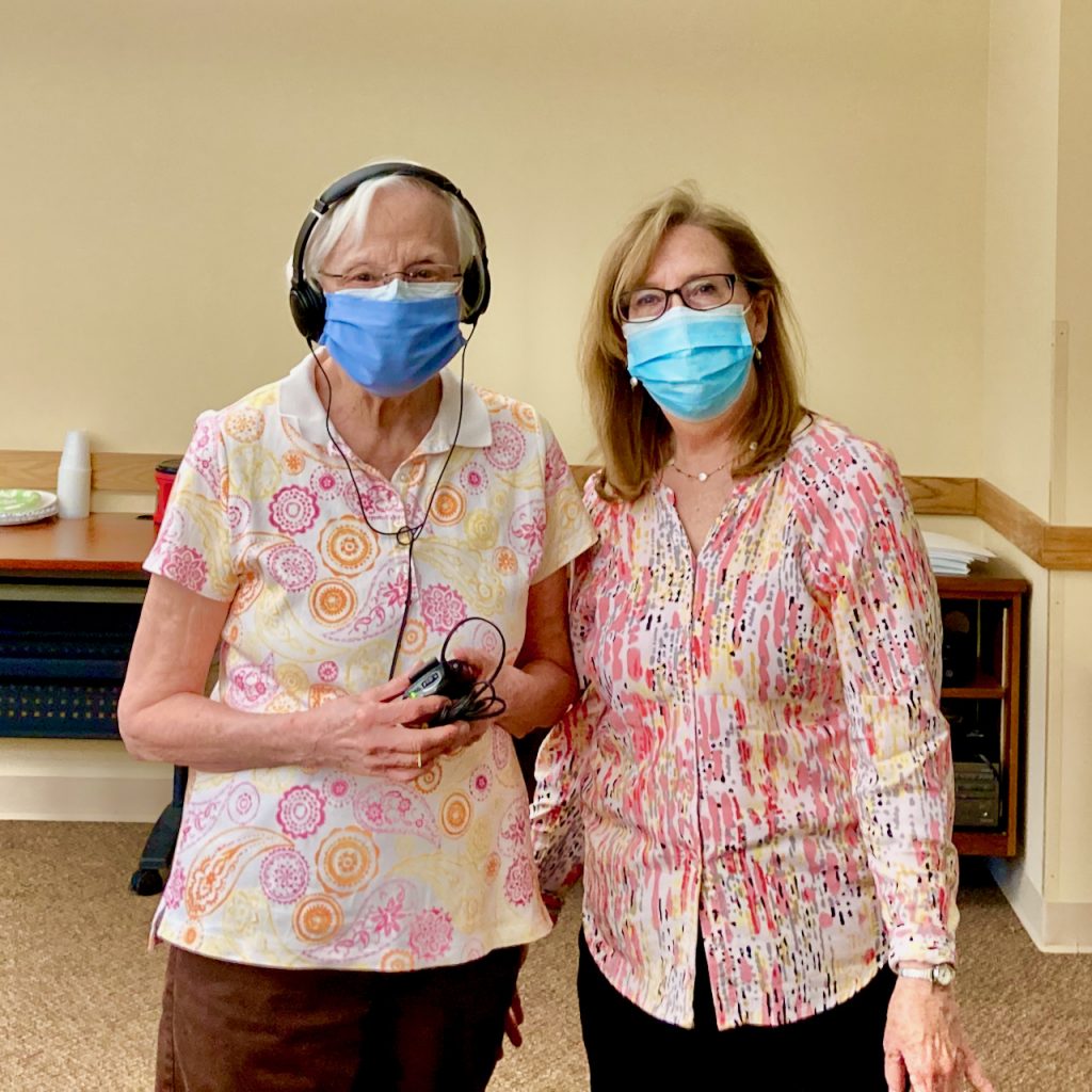 Two women in face masks