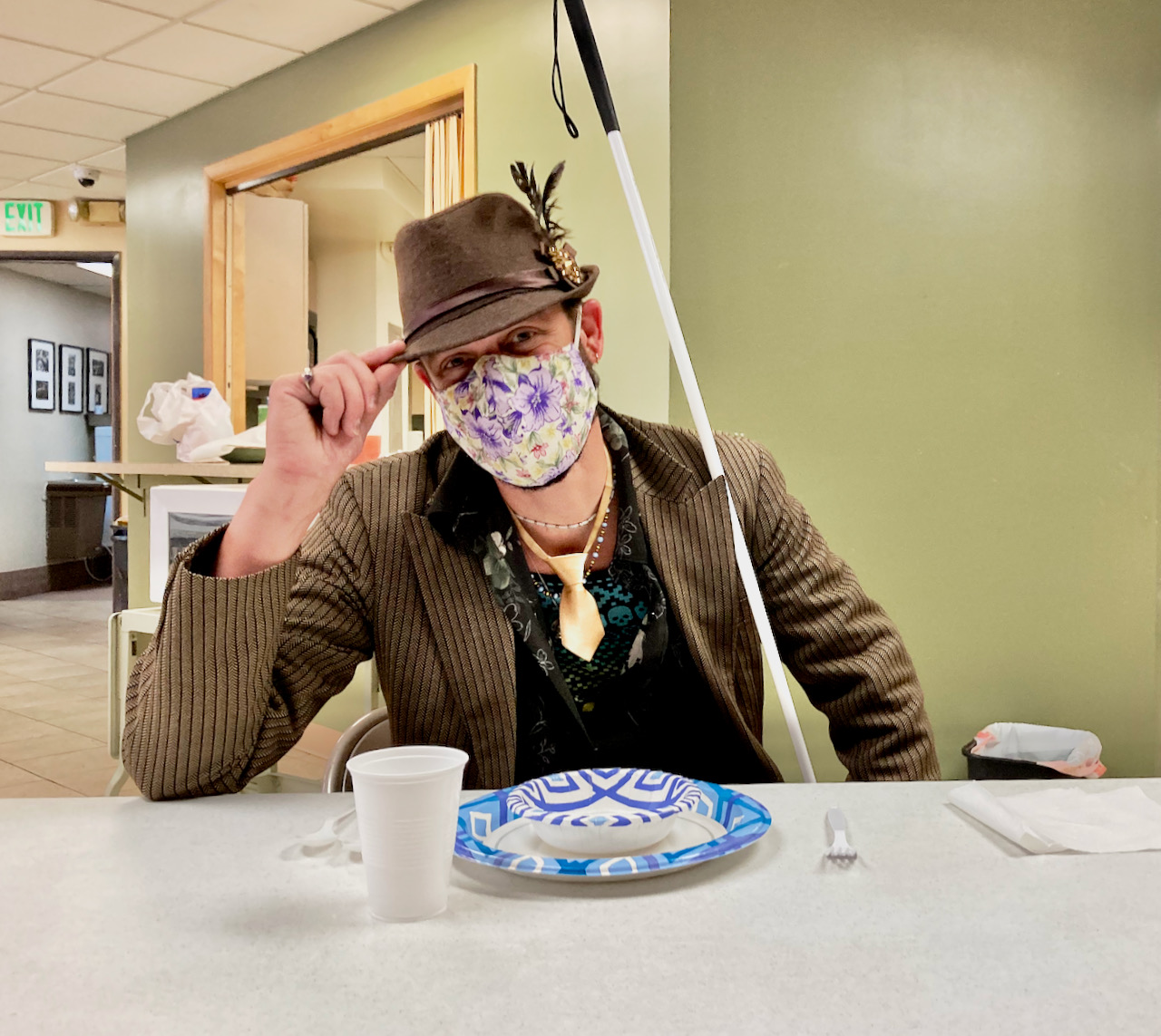 Dan H gives a tip of his brown felt hat on Etiquette Day, the height of good manners