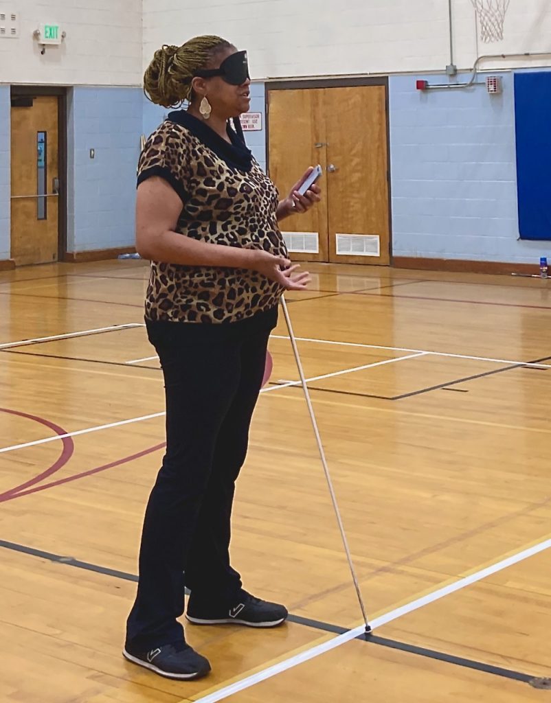 Jamila leading a Privilege Walk Activity in the Gym