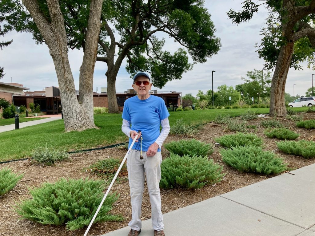 Driver Phil with white cane